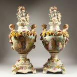 A PAIR OF MEISSEN STYLE VASES, COVERS AND STANDS, with cherub and crown finial. 72cms high.