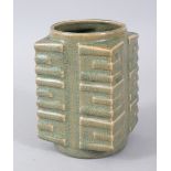 A SMALL GREEN CRACKLE GLAZE KONG VASE. 14cms high.