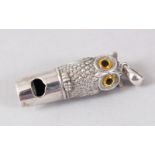 A NOVELTY SILVER OWL WHISTLE.