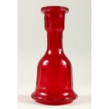 A GOOD BOHEMIAN RED BELL SHAPED DECANTER. 27cm high.