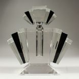 A LARGE ART DECO STYLE BLACK AND CLEAR GLASS SCENT BOTTLE. 23cms high.
