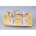 A BOTTEGA VENETA YELLOW AND CREAM BAG, in a Bottega Veneta bag.