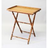 A VICTORIAN BUTLERS OAK TRAY ON STAND.