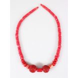 A HEAVY RED CORAL NECKLACE.