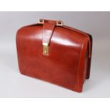 A GENTLEMAN'S PRATESI BROWN LEATHER BRIEFCASE.