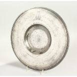 A SUPERB EARLY PEWTER CIRCULAR ALMS DISH, engraved with a MITRE. 31cms diameter.