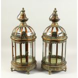 A PAIR OF DECORATIVE HALL LANTERNS. 60cms high.