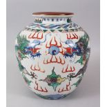 A GOOD CHINESE WANLI STYLE VASE, painted with dragons. 28cms high.