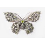 A LARGE 9CT GOLD AND SILVER, PERIDOT AND DIAMOND BUTTERFLY BROOCH.