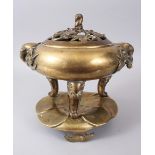 A LARGE 19TH CENTURY CHINESE BRONZE CENSER, COVER AND STAND. 23cms diameter.