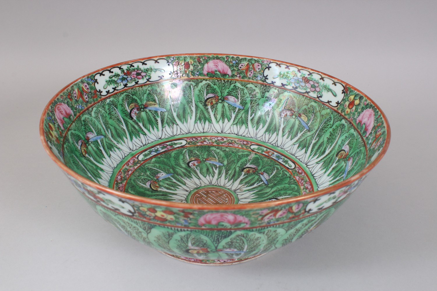 AN EARLY 20TH CENTURY CHINESE CANTON BUTTERFLY AND CABBAGE LEAF BOWL. 31cms diameter. - Image 4 of 7