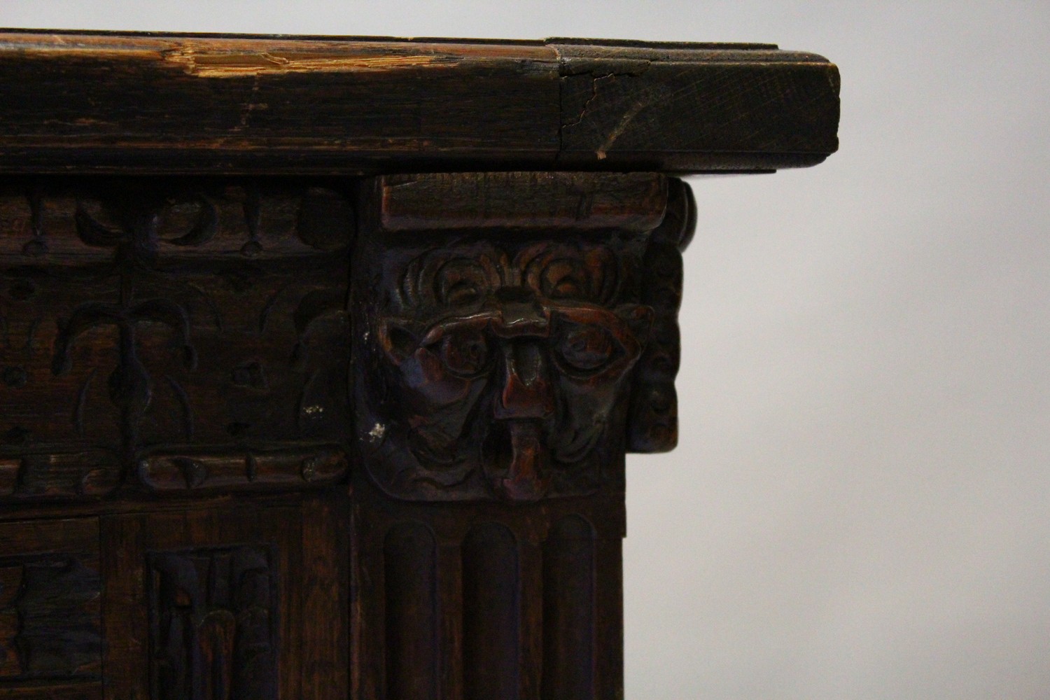 A LARGE 17TH-18TH CENTURY FRENCH OAK COFFER, with two plain panels to the top and two carved - Image 5 of 13