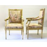 A GOOD PAIR OF LOUIS XVI DESIGN GILTWOOD FAUTEUIL, with padded needlework backs and seats.