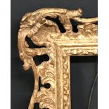 20th Century English School. A Gilt Composition Frame, with Swept and Pierced Centres and Corners,