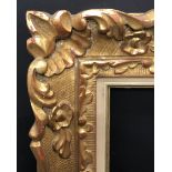 20th Century European School. A Carved Giltwood Frame, with fabric slip, 24" x 18" (rebate), without