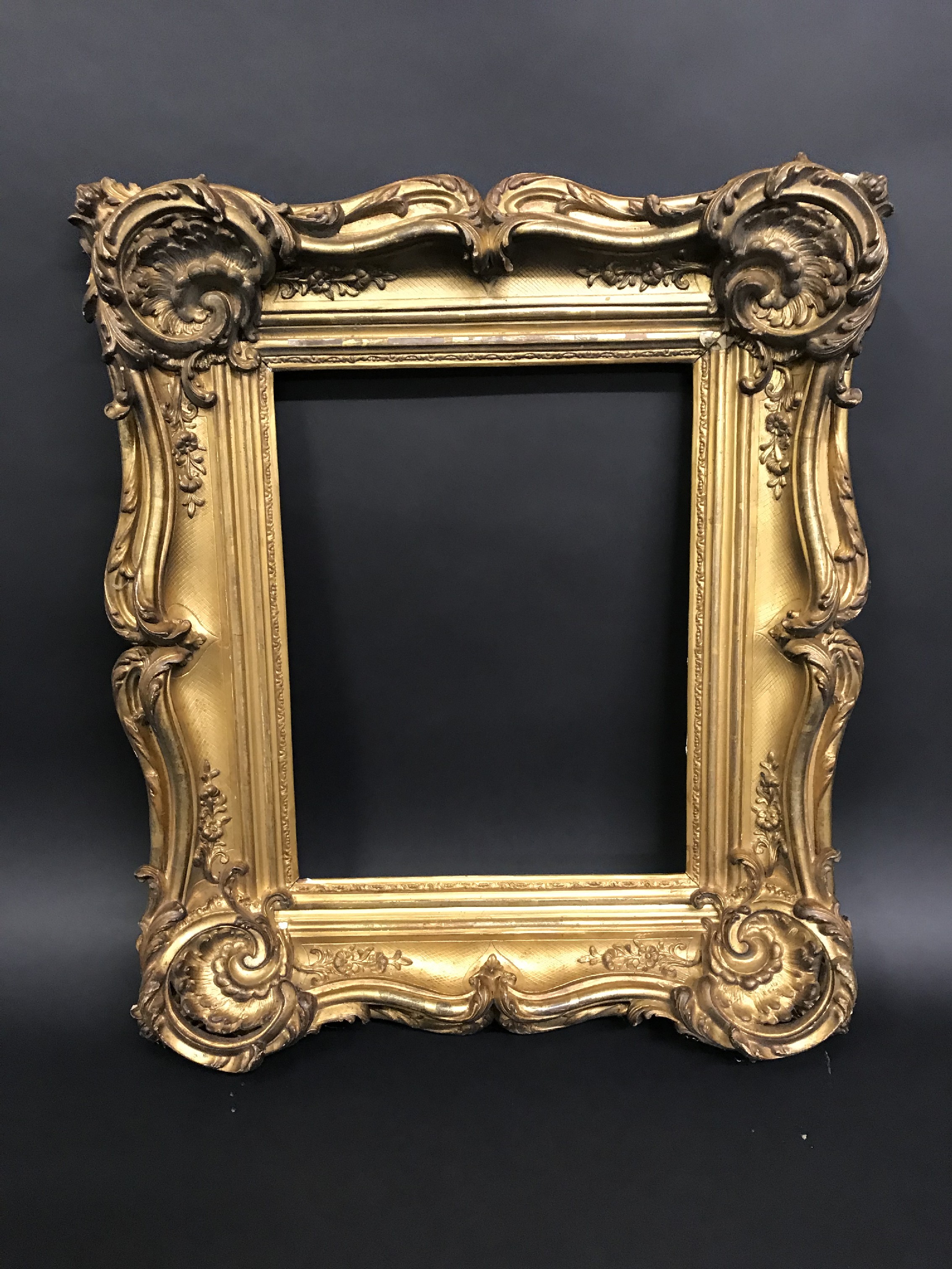 19th Century European School. A Gilt Composition Frame, with Swept Centres and Corners, 14" x 11" ( - Image 2 of 3