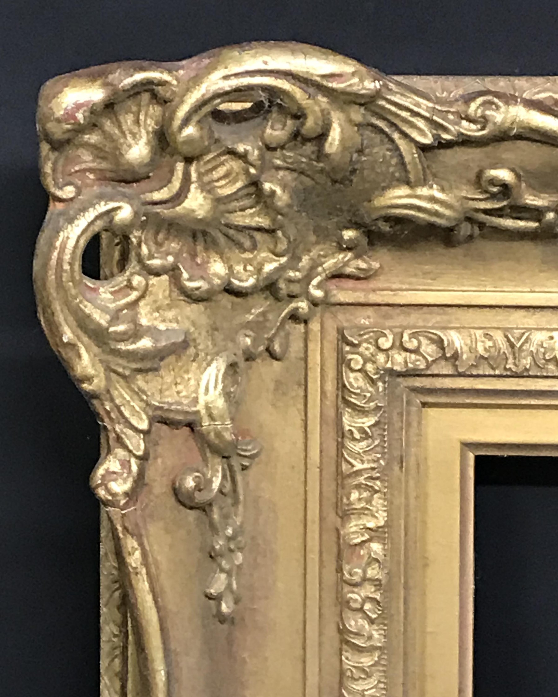 20th Century English School. A Gilt Composition Frame, with Swept and Pierced Centres and Corners,