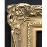 20th Century English School. A Gilt Composition Frame, with Swept and Pierced Centres and Corners,