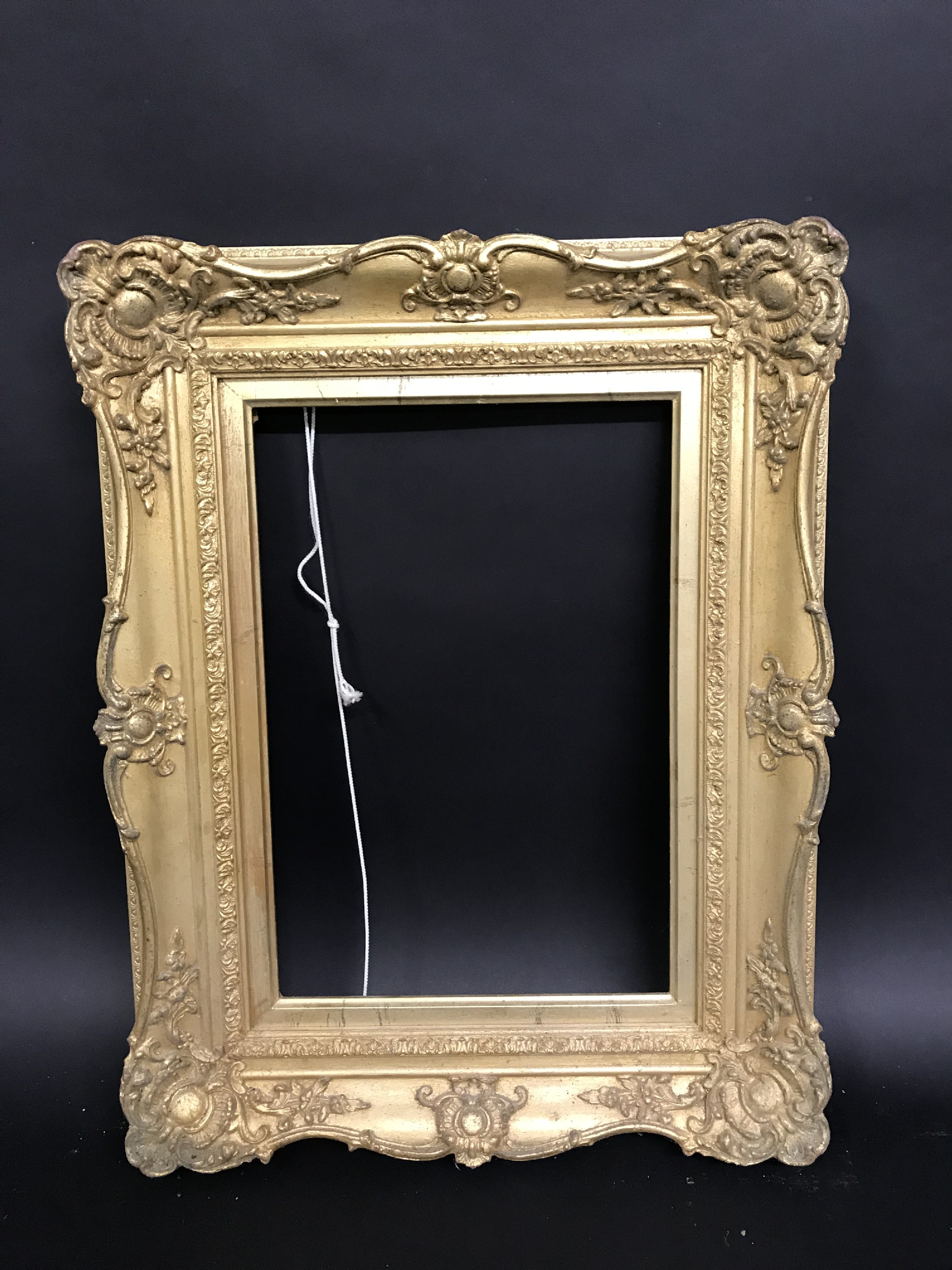 20th Century English School. A Gilt Composition Frame, with Swept Centres and Corners, 16" x 11" ( - Image 2 of 3