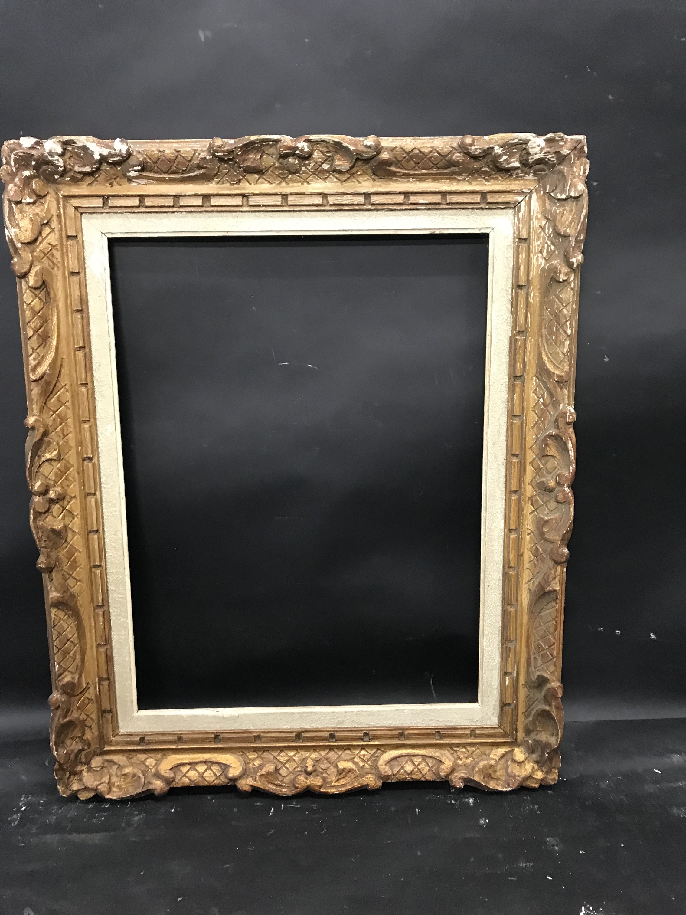 20th Century European School. A Carved Giltwood Frame, with a white inner slip, 24" x 18" (rebate). - Image 2 of 3