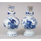 A SMALL PAIR OF CHINESE KANGXI BLUE AND WHITE PORCELAIN VASES, the body of the vases with decoration