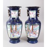 A PAIR 19TH CENTURY CHINESE BLUE ENAMEL VASES, the main painted panels of the vases depicting