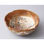 A JAPANESE MEIJI PERIOD SATSUMA PORCELAIN BOWL, painted with scenes of ladies and children in a