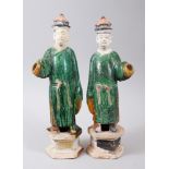 A GOOD PAIR OF LARGE MING DYNASTY SANCAI POTTERY TOMB FIGURES, the figures with removable heads,