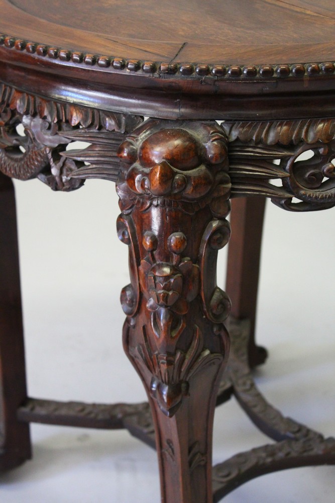 A CHINESE REDWOOD STAND, with inset hardstone top on carved legs. 73cm diameter. - Image 2 of 7
