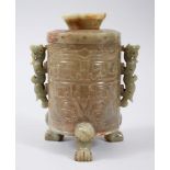A GOOD CHINESE CARVED JADE JAR AND COVER, with carved decoration of geometric style, with twin