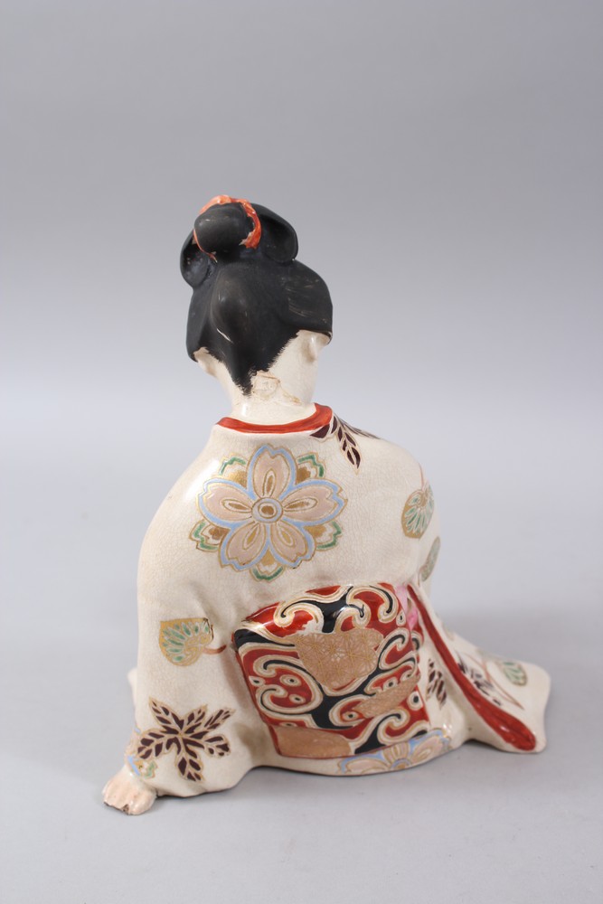 A JAPANESE LATE MEIJI PERIOD SATSUMA FIGURE OF A GEISHA, modeled in a seated reclined position - Image 3 of 7