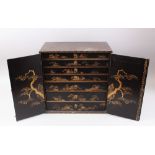 A GOOD JAPANESE MEIJI PERIOD LACQUER TABLE / COLLECTORS CABINET, the cabinet decorated profusely