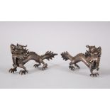 TWO LATE 19TH / EARLY 20TH CENTURY CHINESE SOLID SILVER DRAGON FIGURES, 8.5cm long X 4.5cm high. (