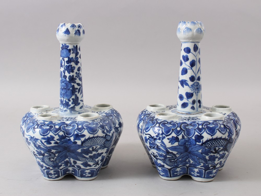 A PAIR OF 19TH CENTURY CHINESE BLUE & WHITE PORCELAIN TULIP HEAD BOTTLE VASES, both decorated with