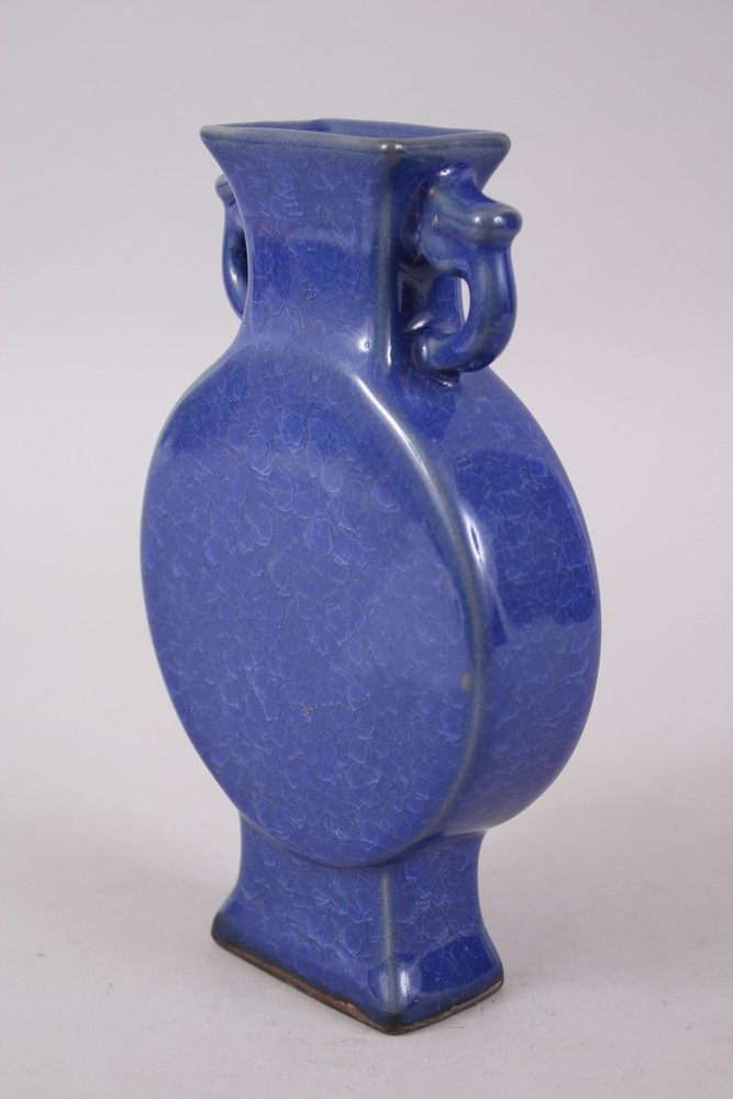 A 20TH CENTURY CHINESE COBALT BLUE CRACKLE GLAZE TWIN HANDLE MOON FLASK, the base bearing a six - Image 2 of 4