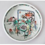 A LARGE CHINESE KANGXI STYLE FAMILLE VERTE PORCELAIN DISH, the centre of the dish depicting