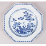 AN 18TH CENTURY QIANLONG BLUE & WHITE OCTAGONAL PORCELAIN DISH, decorated with a garden scene.