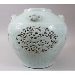 A LARGE CHINESE CELADONO GROUND PIERCED MING STYLE PORCELAIN VASE, the moulded lappet border beneath