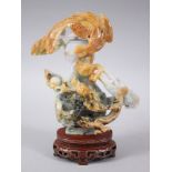 A GOOD EARLY 20TH CENTURY CHINESE JADE DRAGON LIDDED VASE, the body of the vase with carved dragon