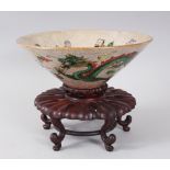 A LATE 19TH CENTURY CHINESE CRACKLEGLAZE FAMILLE ROSE EIGHT IMMORTAL PORCELAIN BOWL, the bowls