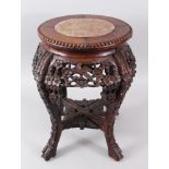 A SMALL 19TH CENTURY CHINESE MARBLE TOP HARDWOOD TABLE / PLANTER, the top inset with marble, the