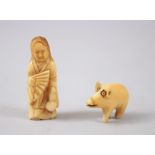 TWO JAPANESE LATE MEIJI PERIOD CARVED IVORY FIGURES, one of a lady holding a fan, the other of a