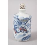 AN UNUSUAL 19TH CENTURY CHINESE BLUE & WHITE UNDERGLAZED RED PORCELAIN SNUFF BOTTLE, the