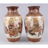 A GOOD PAIR OF JAPANESE MEIJI PERIOD SATSUMA PORCELAIN VASES, finely painted with scenes of immortal