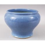 A 19TH CENTURY CHINESE POWDER BLUE PORCELAIN JARDINIERE, 15.5cm high x 22.5cm diameter.