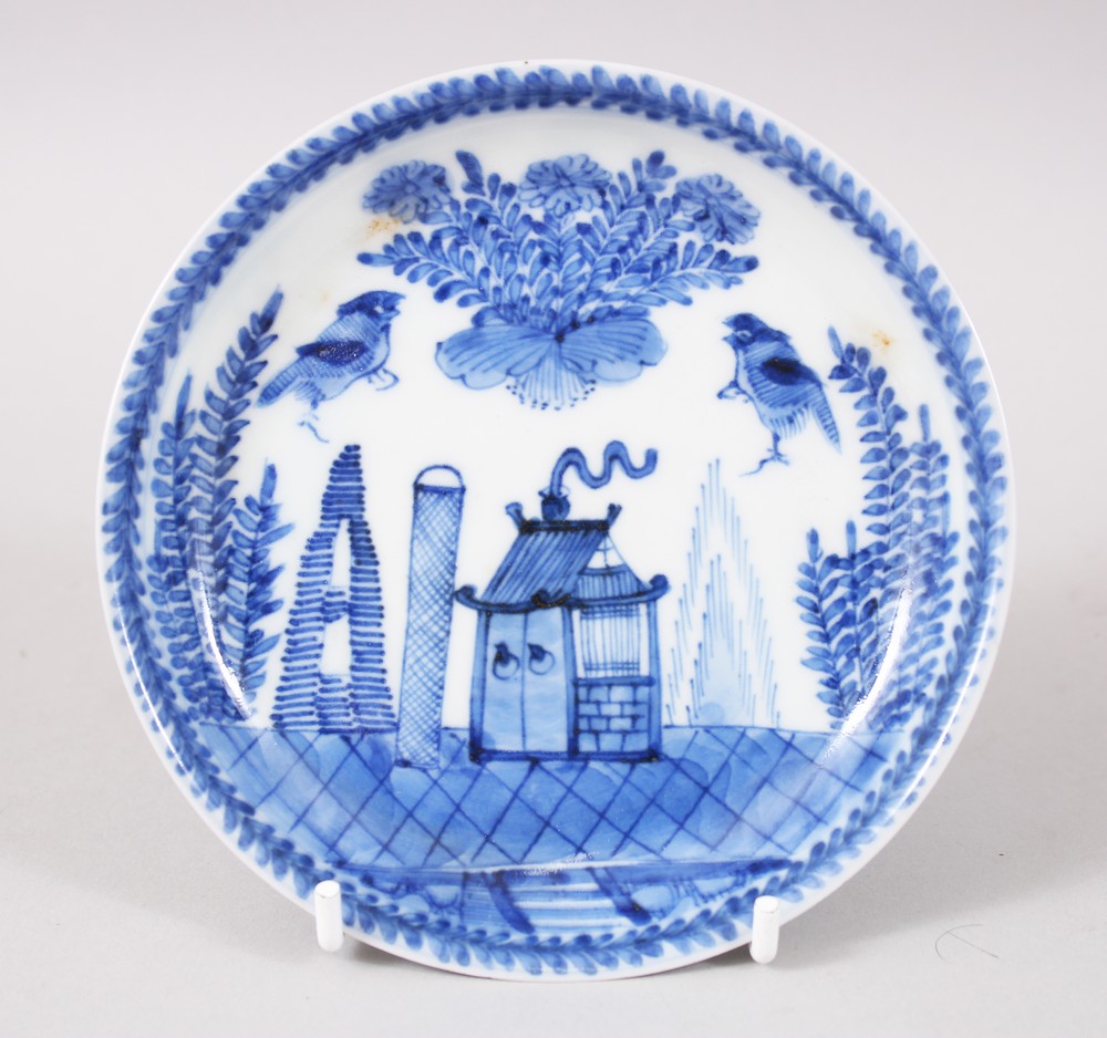 A CHINESE KANGXI BLUE & WHITE PORCELAIN SAUCER DISH, the saucer depicting a landscape scene with
