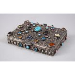 A GOOD INDIAN RECTANGULAR SILVER BOX AND COVER inset with coloured stones, 16cm long x 11.5cm deep x