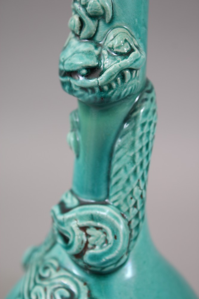 A PAIR OF ORIENTAL TURQUOISE GROUND PORCELAIN DRAGON BOTTLE VASES, both vase with moulded dragons - Image 4 of 6