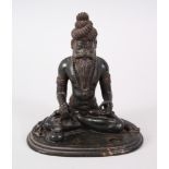 A VERY FINELY CARVED 19TH CENTURY STONE FIGURE OF A SIKH WORSHIPPER sitting cross legged, 11cm