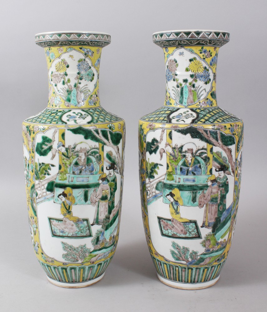 A PAIR OF 19TH CENTURY CHINESE ROULEAU PORCELAIN VASES, the body of the vases with panels